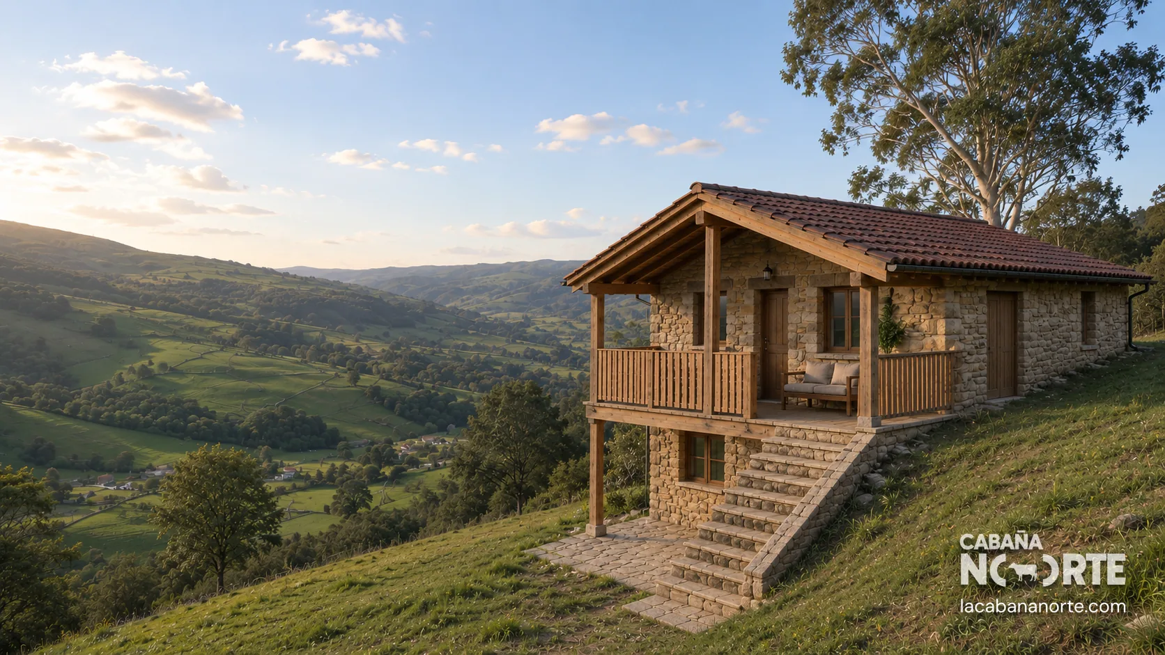 Vista exterior de una cabaña de piedra y madera con terraza, escaleras y paisaje verde de montaña al fondo.